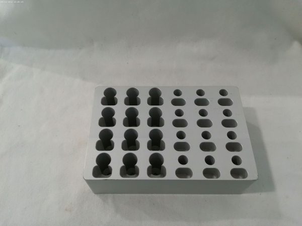 Tecan Tube Adapter, 1.5 mL Microfuge with Hinged Cap, 12-Position (4 x 3), and 0.5 mL Microfuge with Hinged cap, 12-Position (4 x 3), Microplate Format, Aluminum. Has holes for cap storage. 30012613