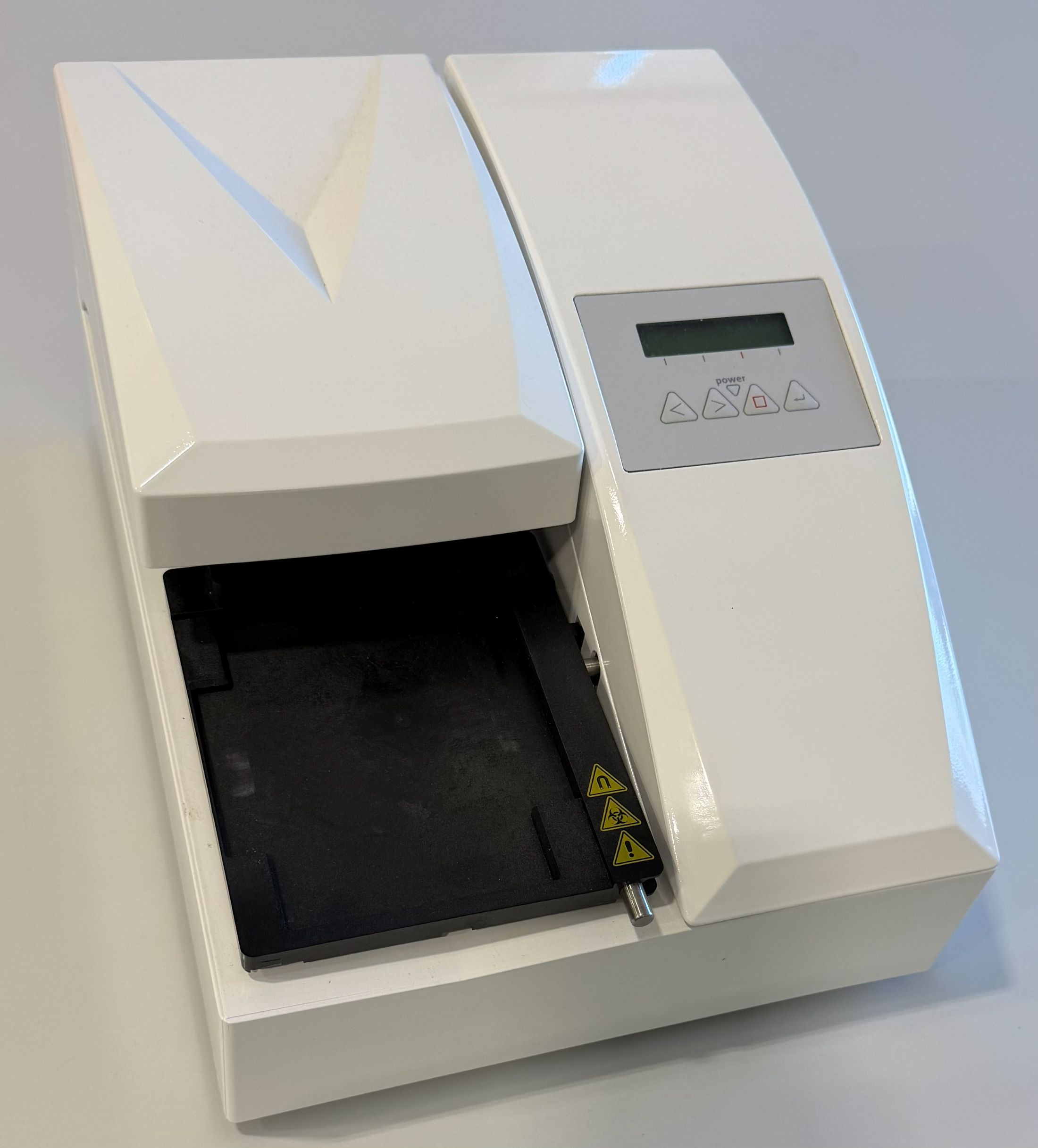Tecan HydroFlex - 30045769 automated microplate washer for 96-well plate formats supporting ELISA, cell-based assays, magnetic bead washing, and vacuum filtration.